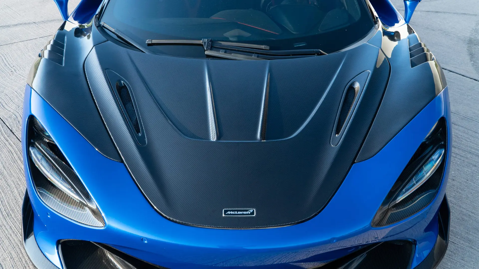 Carbon fiber hood fitted to a McLaren 720S by MMCO at March Motorsports