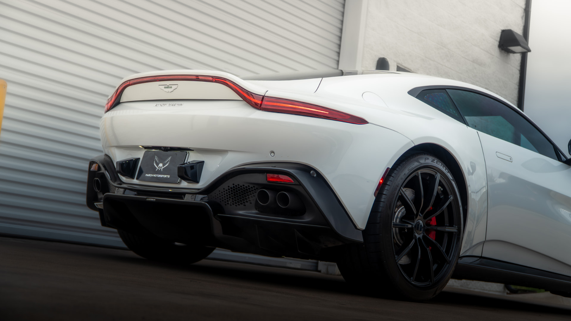 White Aston Martin Vantage outside March Motorsports in Carrollton, Texas