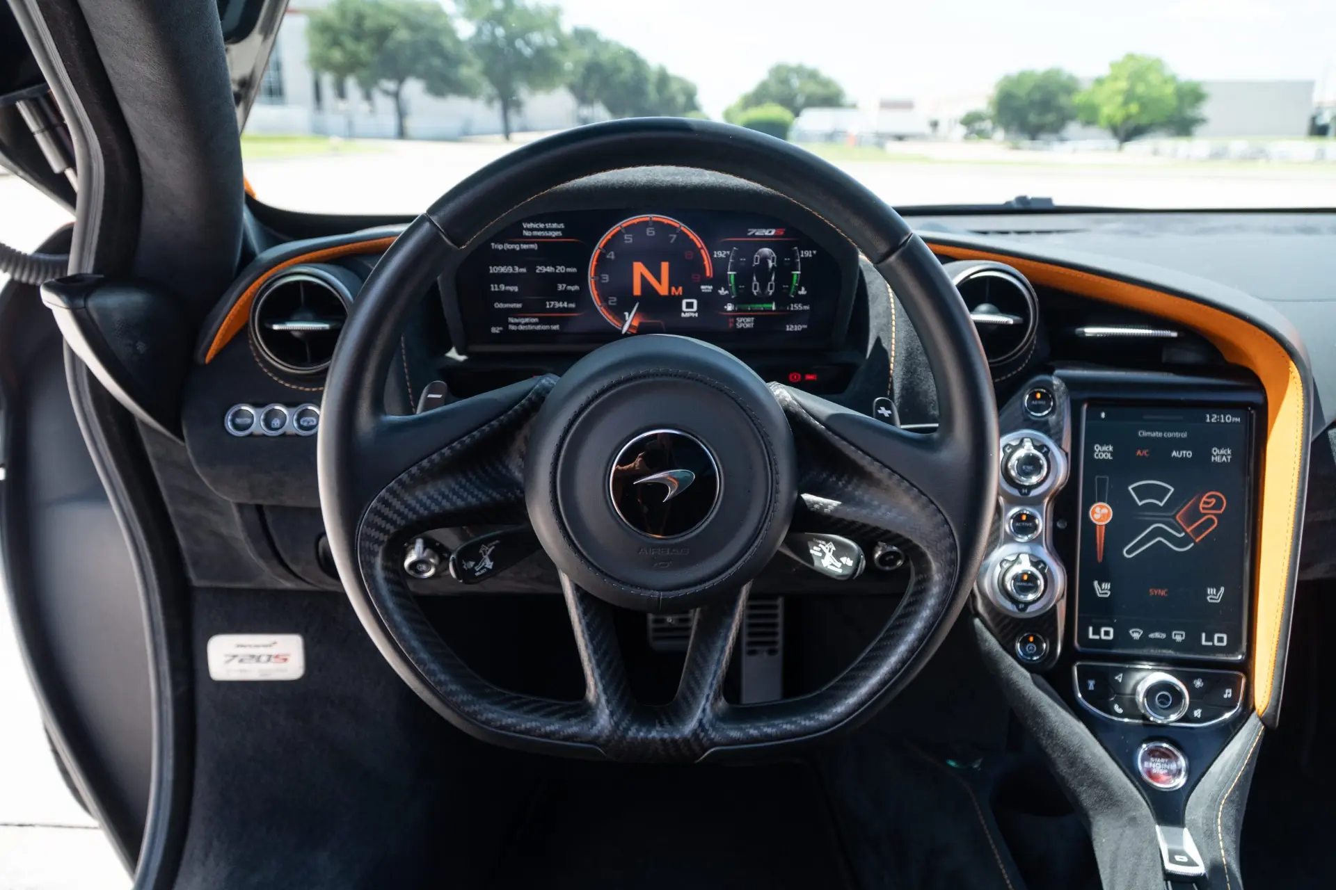 McLaren 720S cockpit with the digital instrument cluster and centre controls
