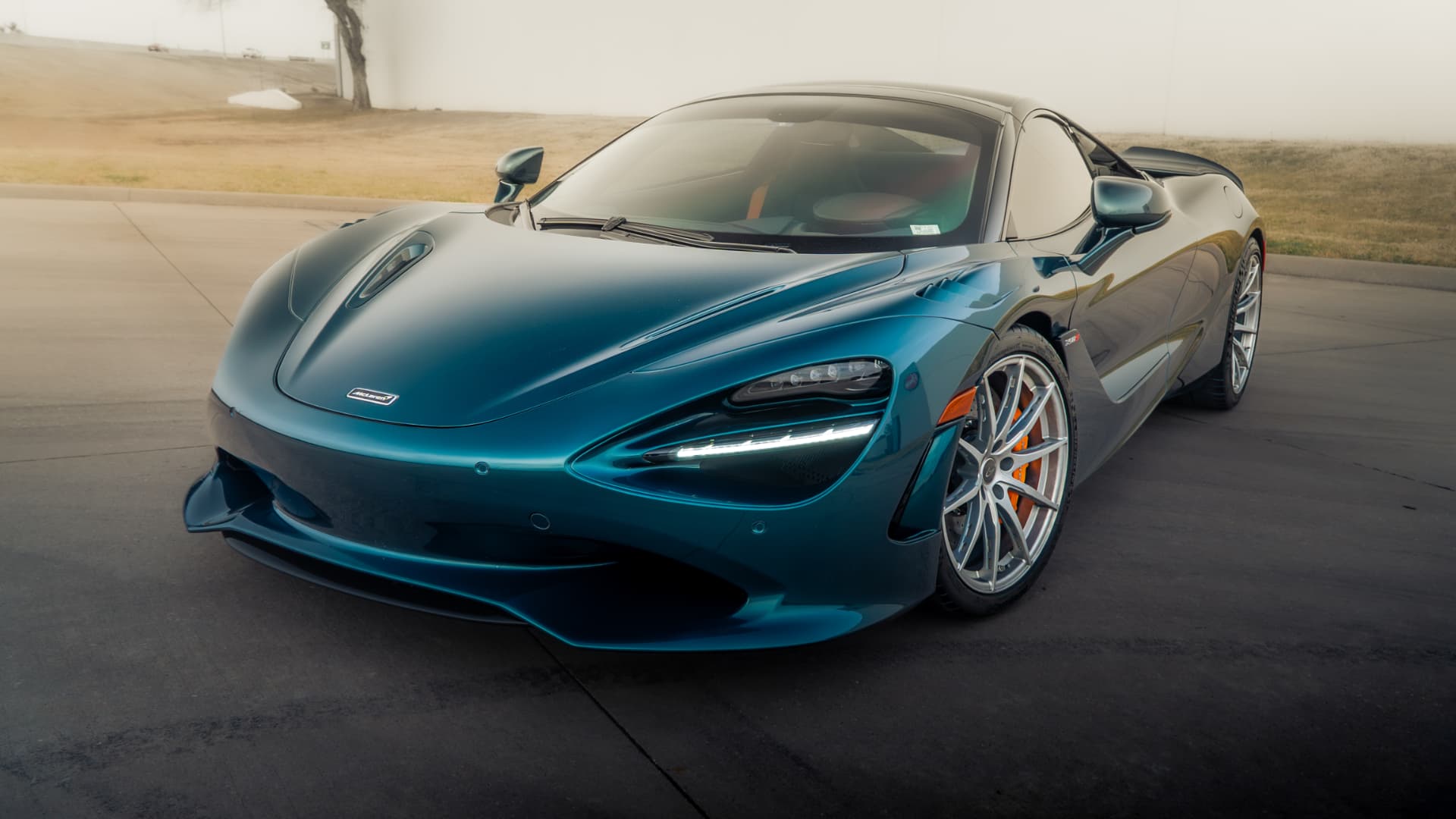 Dark teal McLaren 750S front three-quarter view