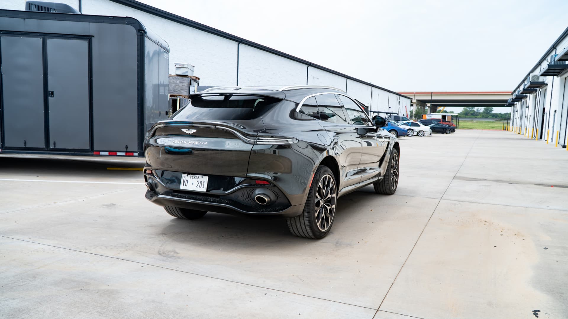Aston Martin DBX outside March Motorsports after service
