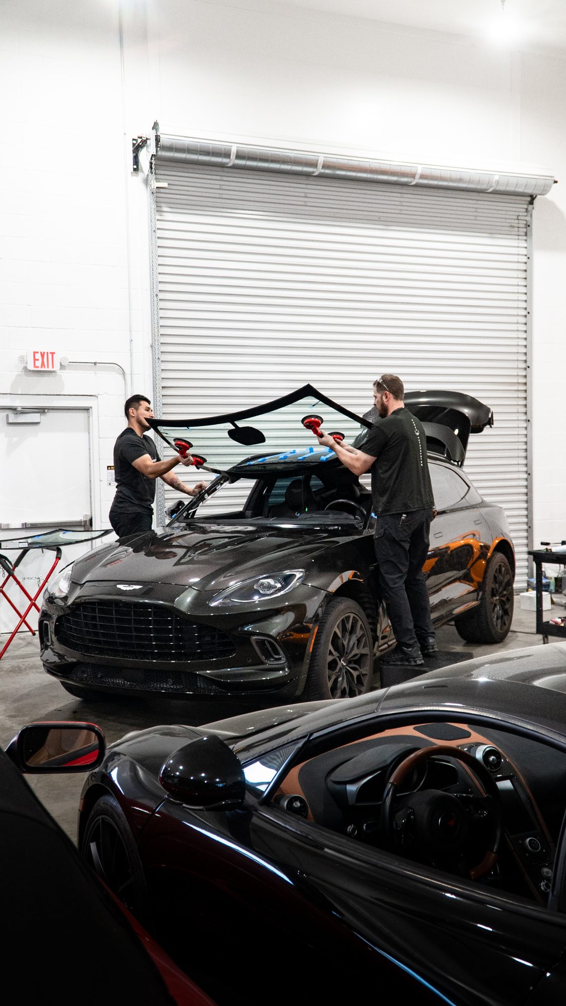 Windshield replacement on an Aston Martin DBX