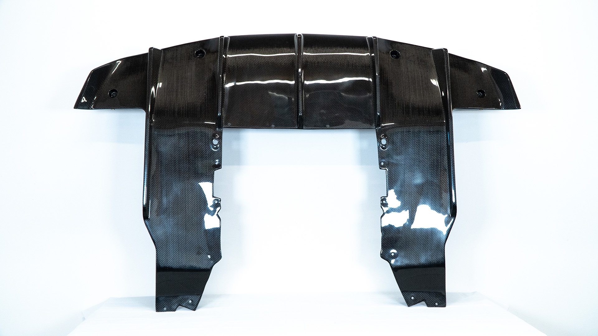 Carbon fiber rear diffuser for the McLaren 720S, studio product view