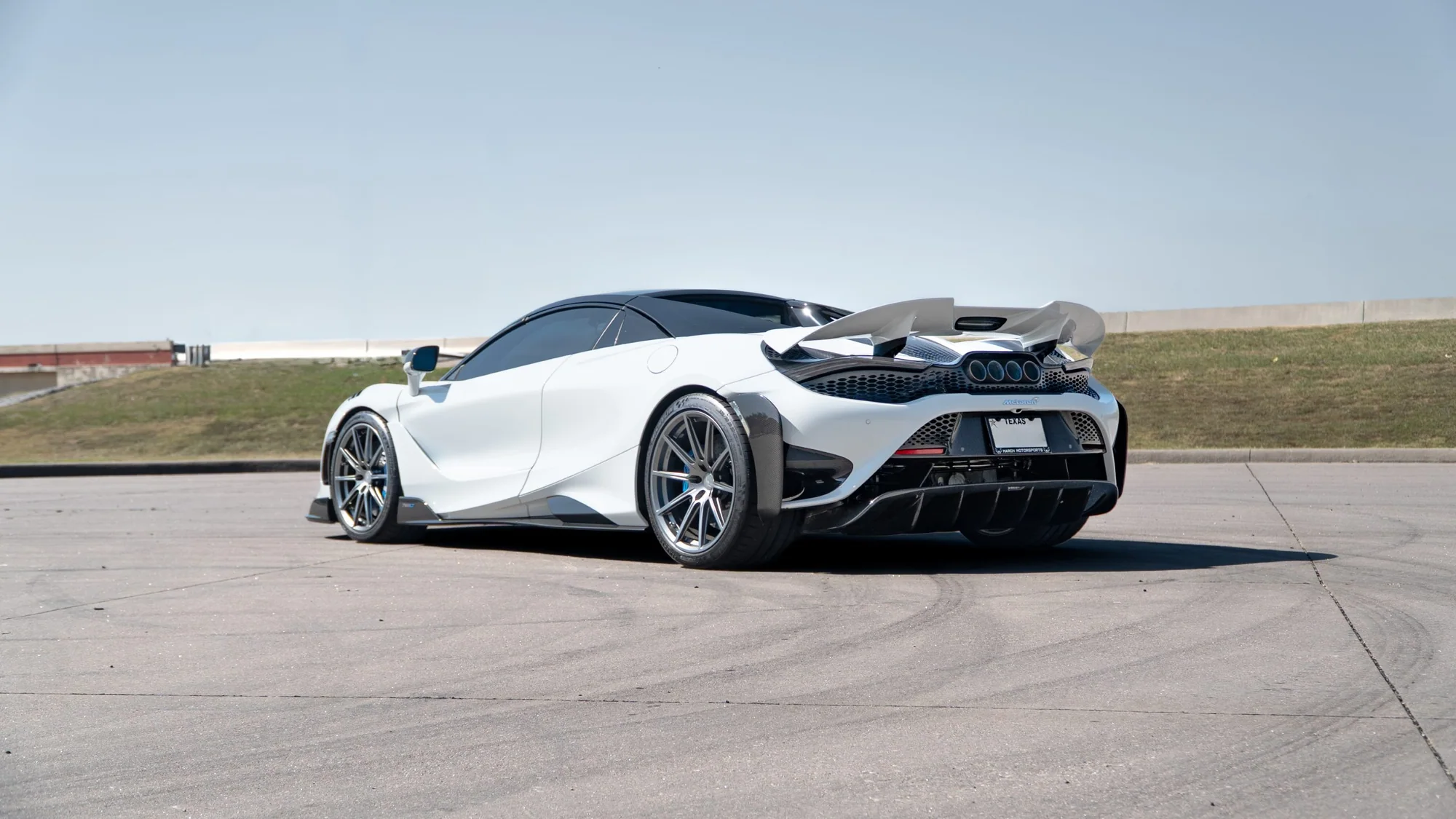 White McLaren 765LT rear view on MMCW1 wheels