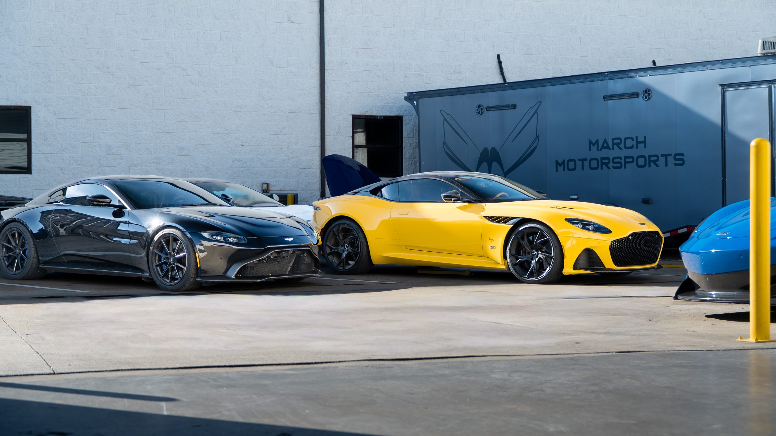Two Aston Martins arriving at March Motorsports