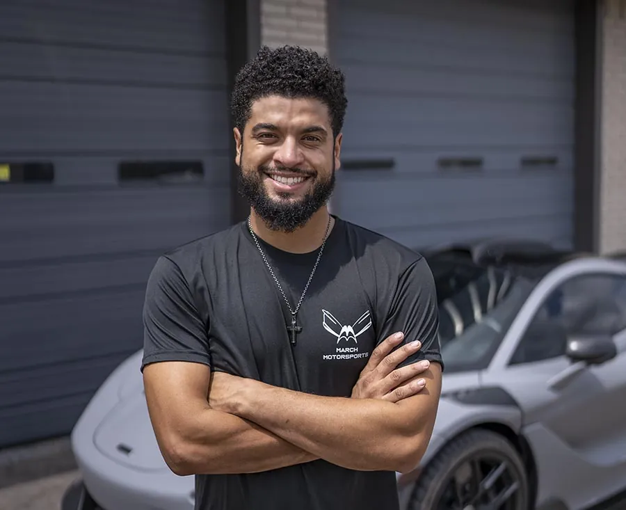 March Motorsports technician outside the bay doors