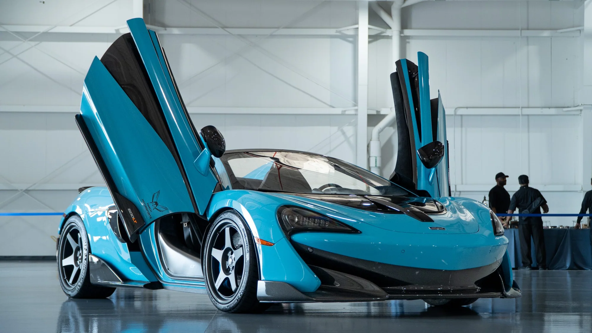 Blue McLaren in a hangar on MMCW2 wheels