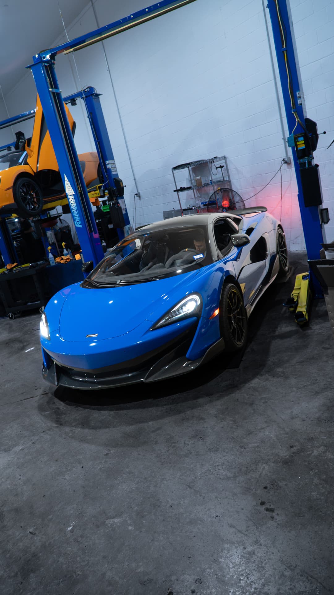 Blue McLaren 600LT in the March Motorsports workshop