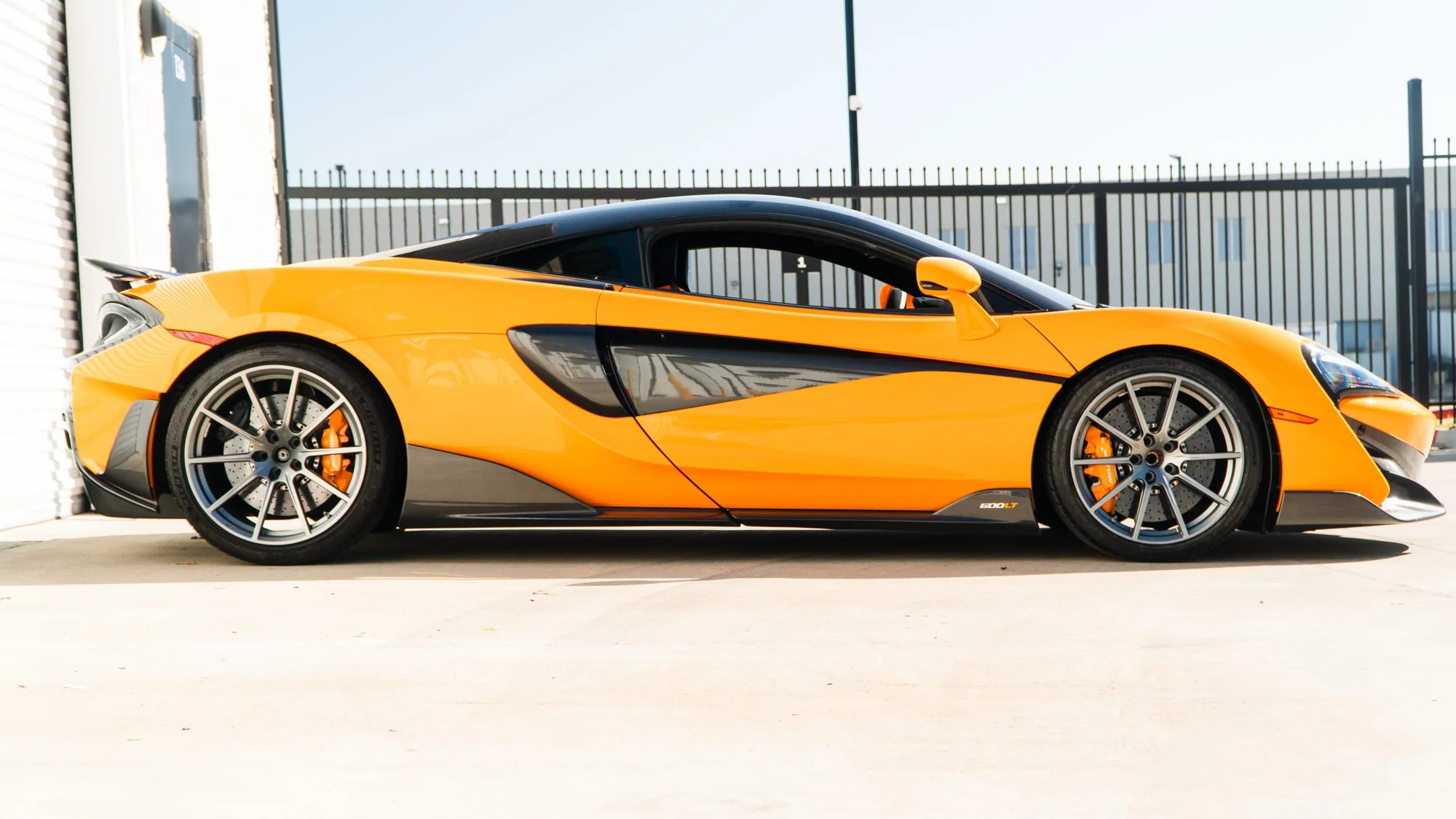Orange McLaren 600LT side profile on MMCW1 wheels