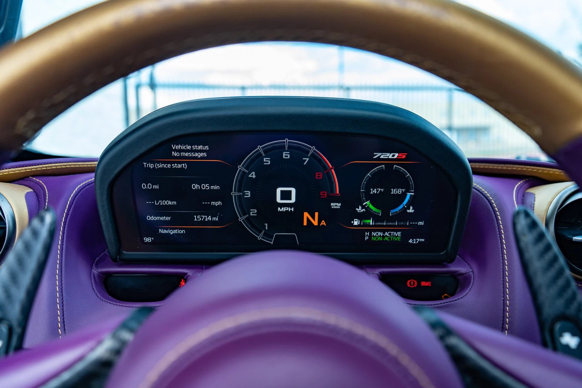 McLaren 720S digital instrument cluster during a performance calibration