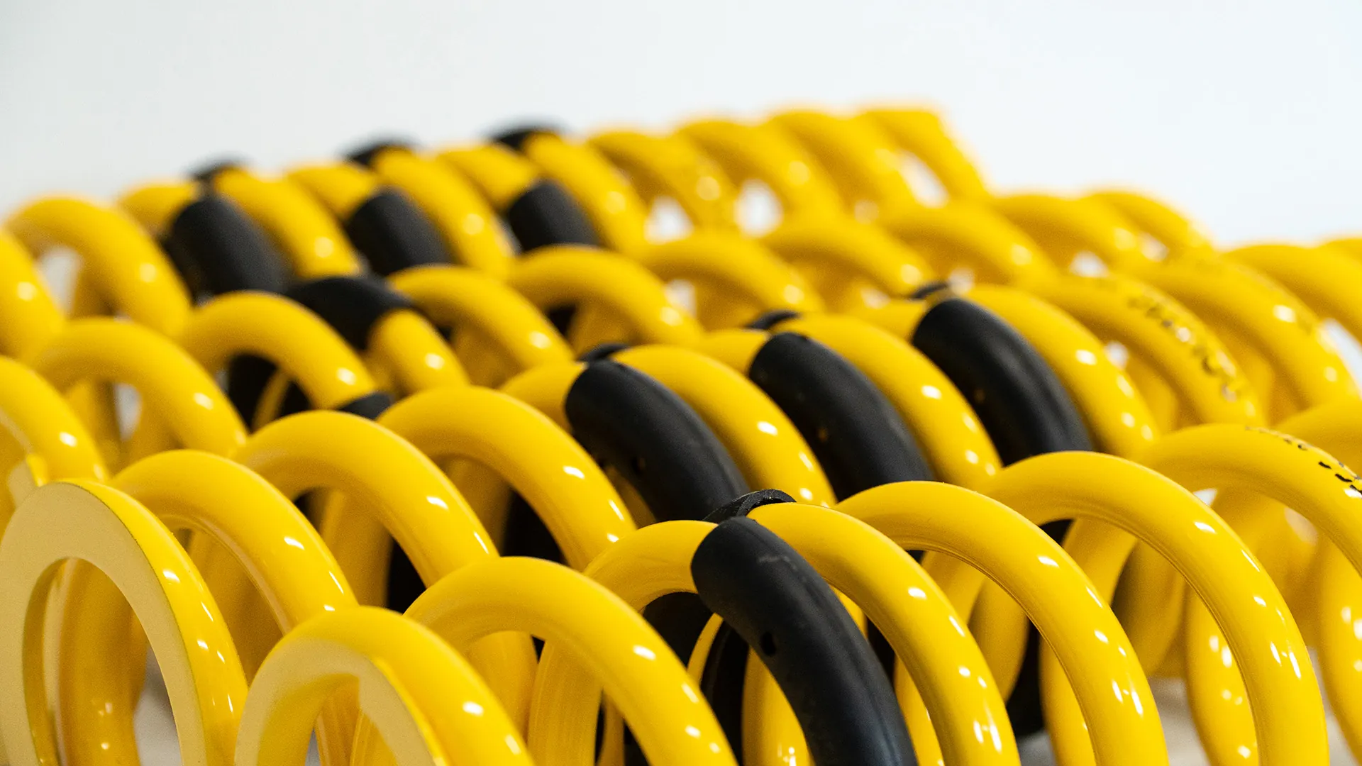 Yellow lowering springs for a McLaren